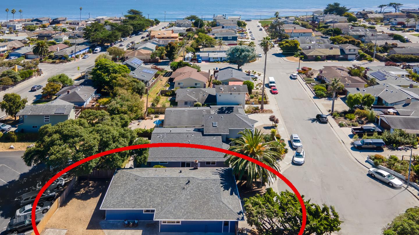 an aerial view of a houses with outdoor space