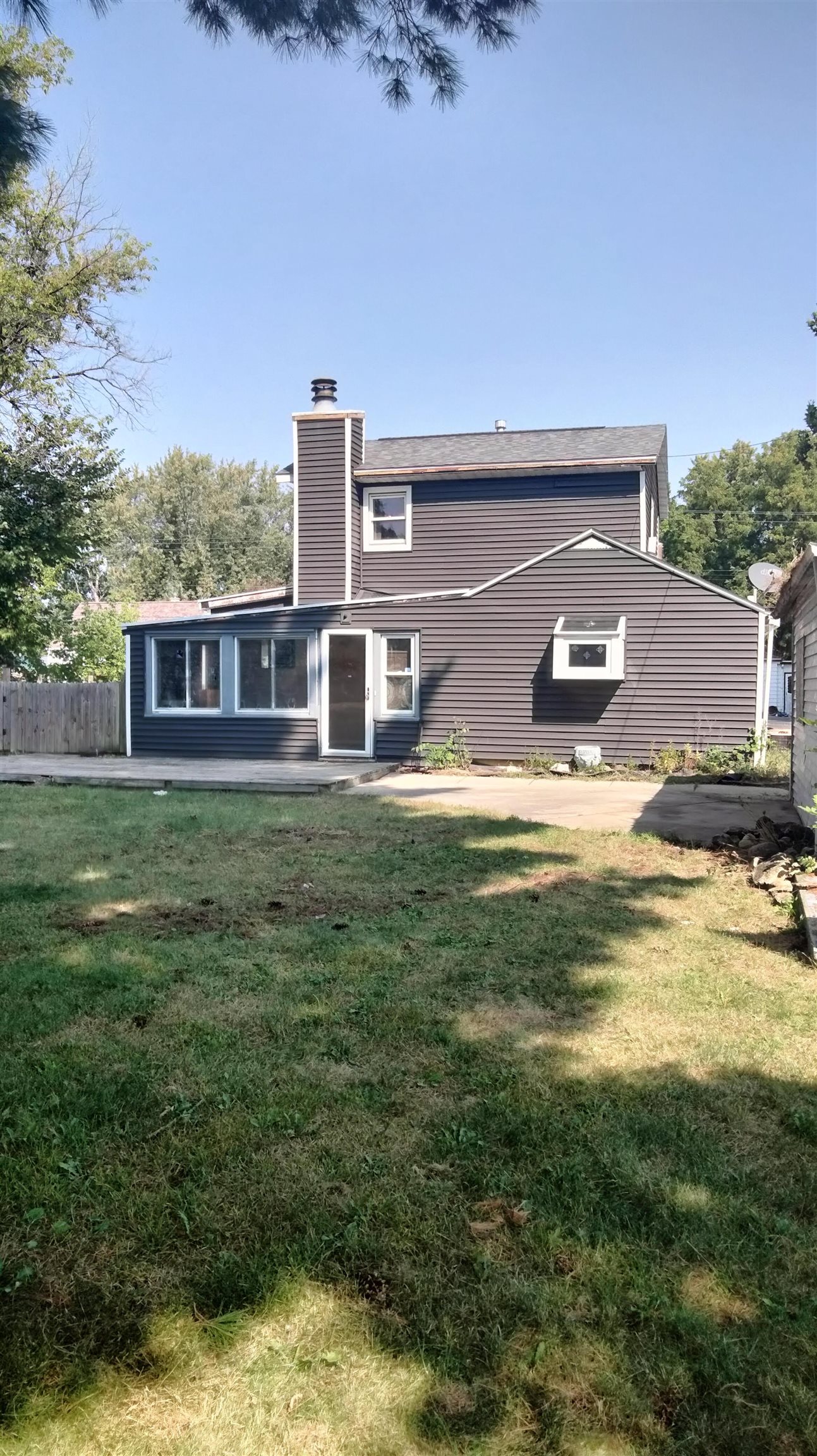 a view of a house with a big yard