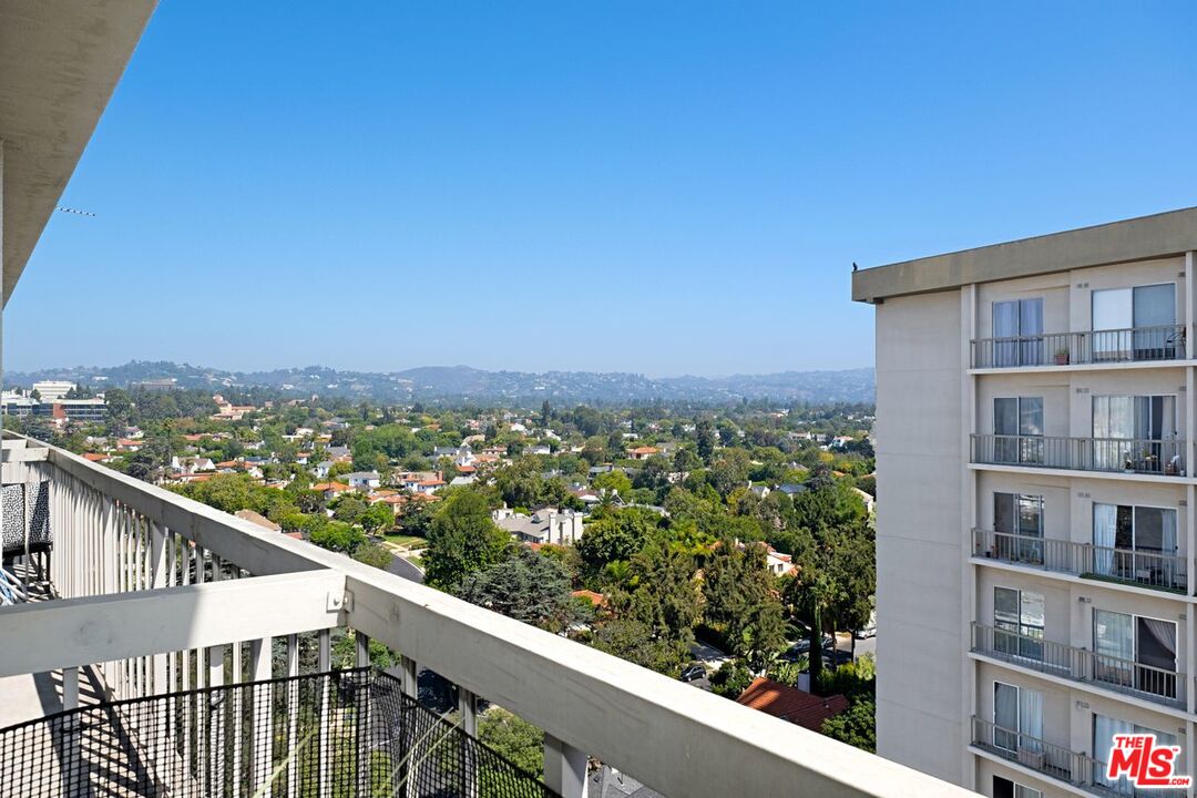 a view of a city from a balcony