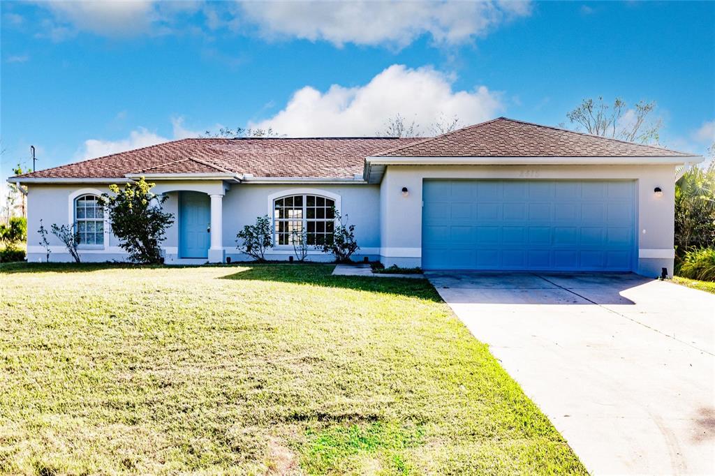 a view of a house with swimming pool