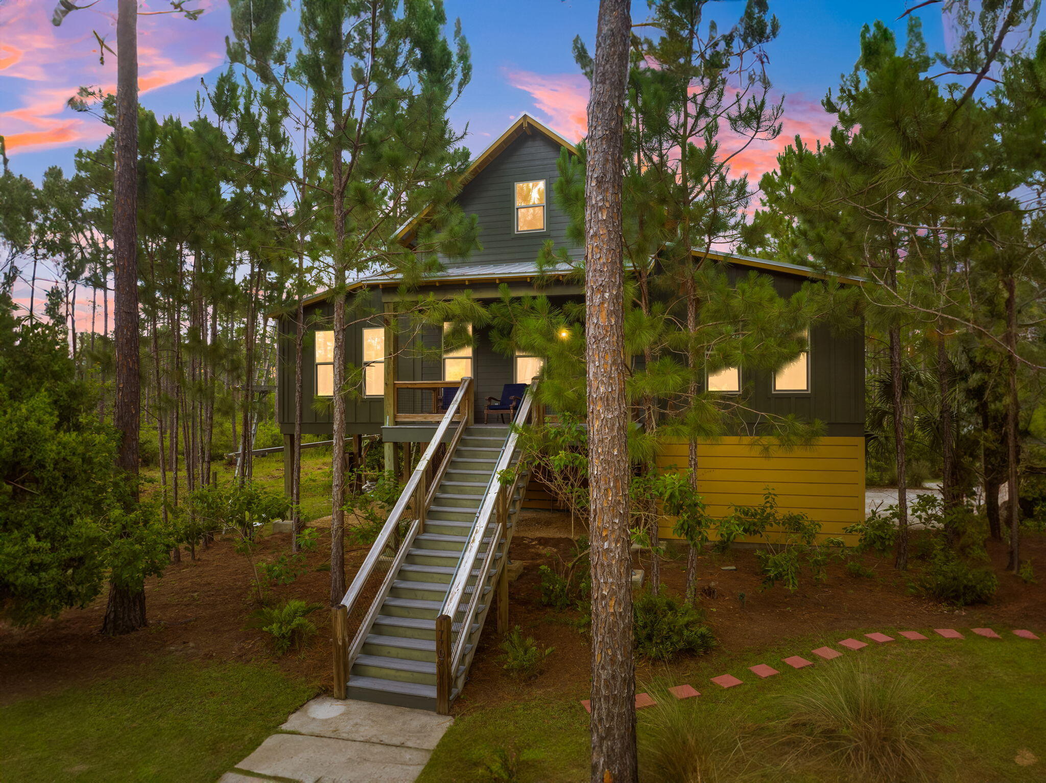 a view of a house with a tree