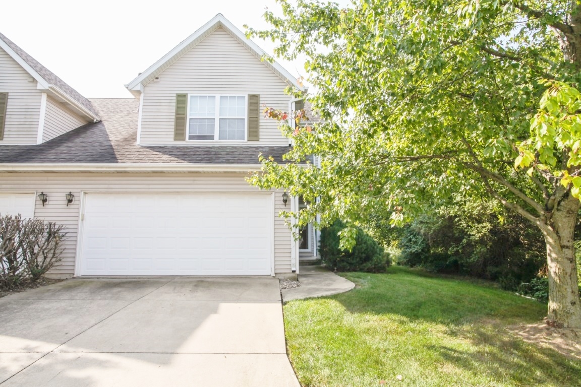 a front view of house with yard