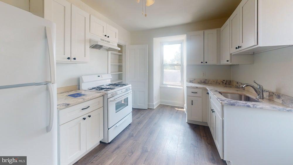 Image of well-designed kitchen of a 2-bed apart.