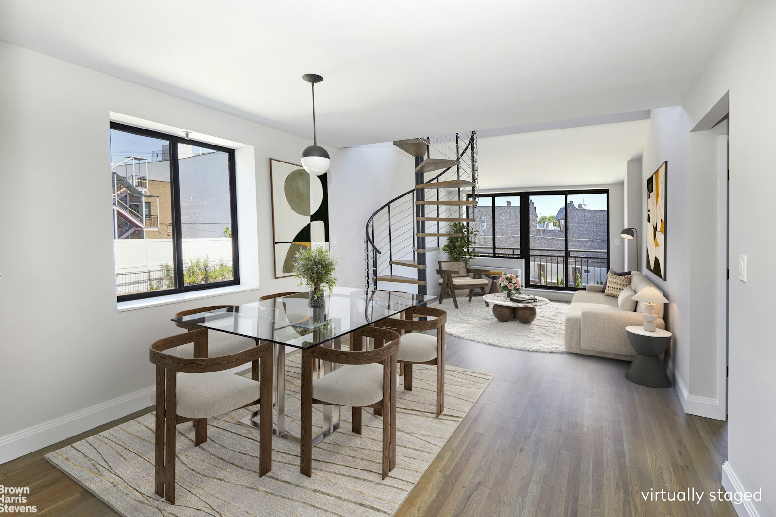 a living room with furniture a chandelier and wooden floor