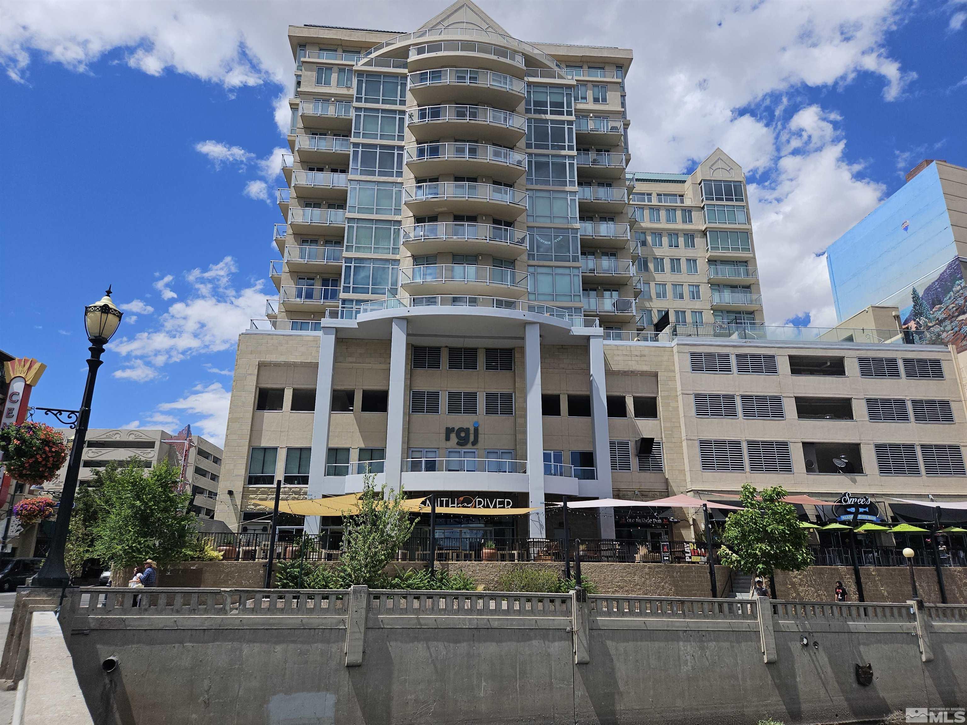 a front view of a building with street view