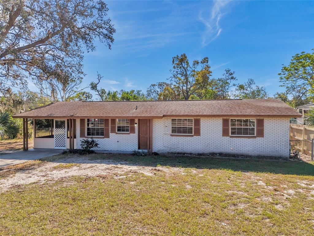 front view of a house with a yard