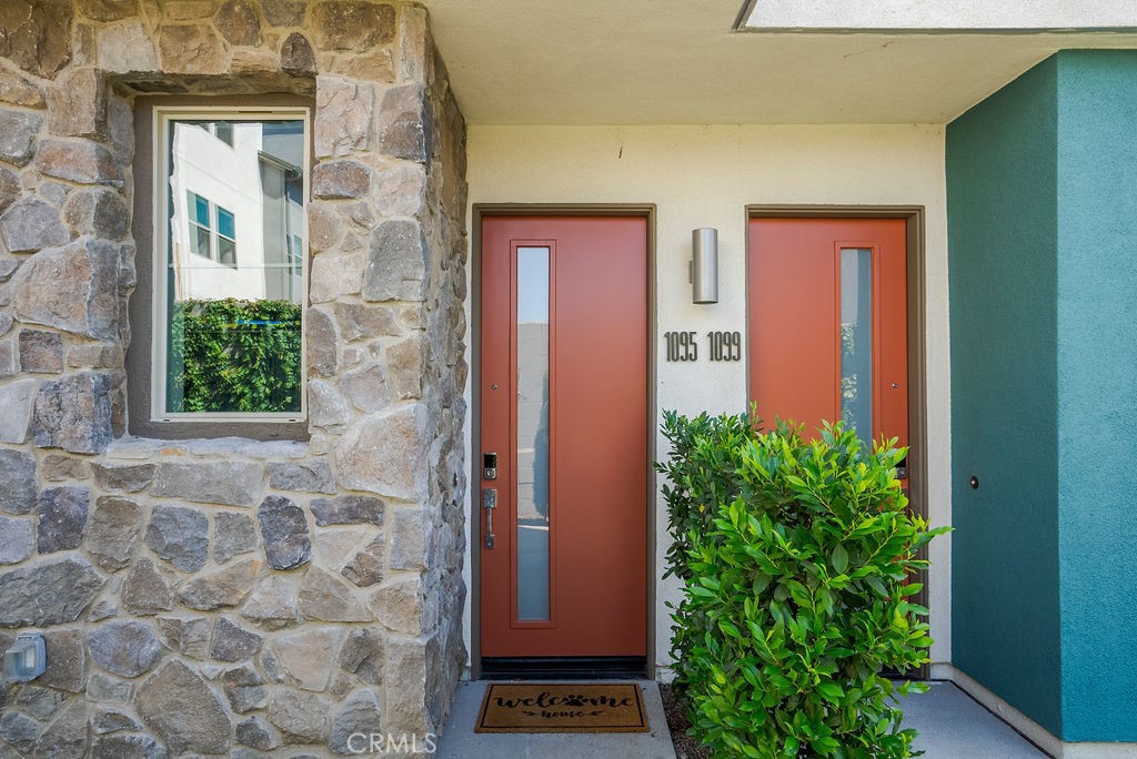 a front view of a house with a entryway