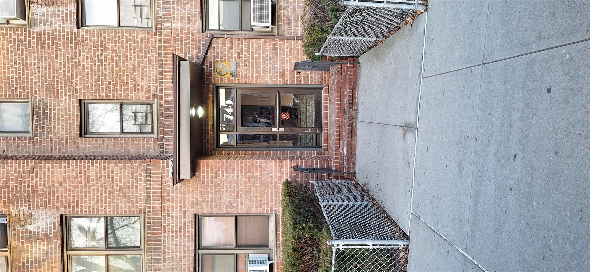 Doorway to property featuring cooling unit