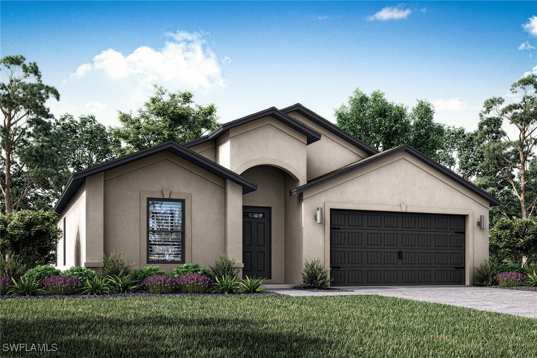 a front view of a house with a yard and garage