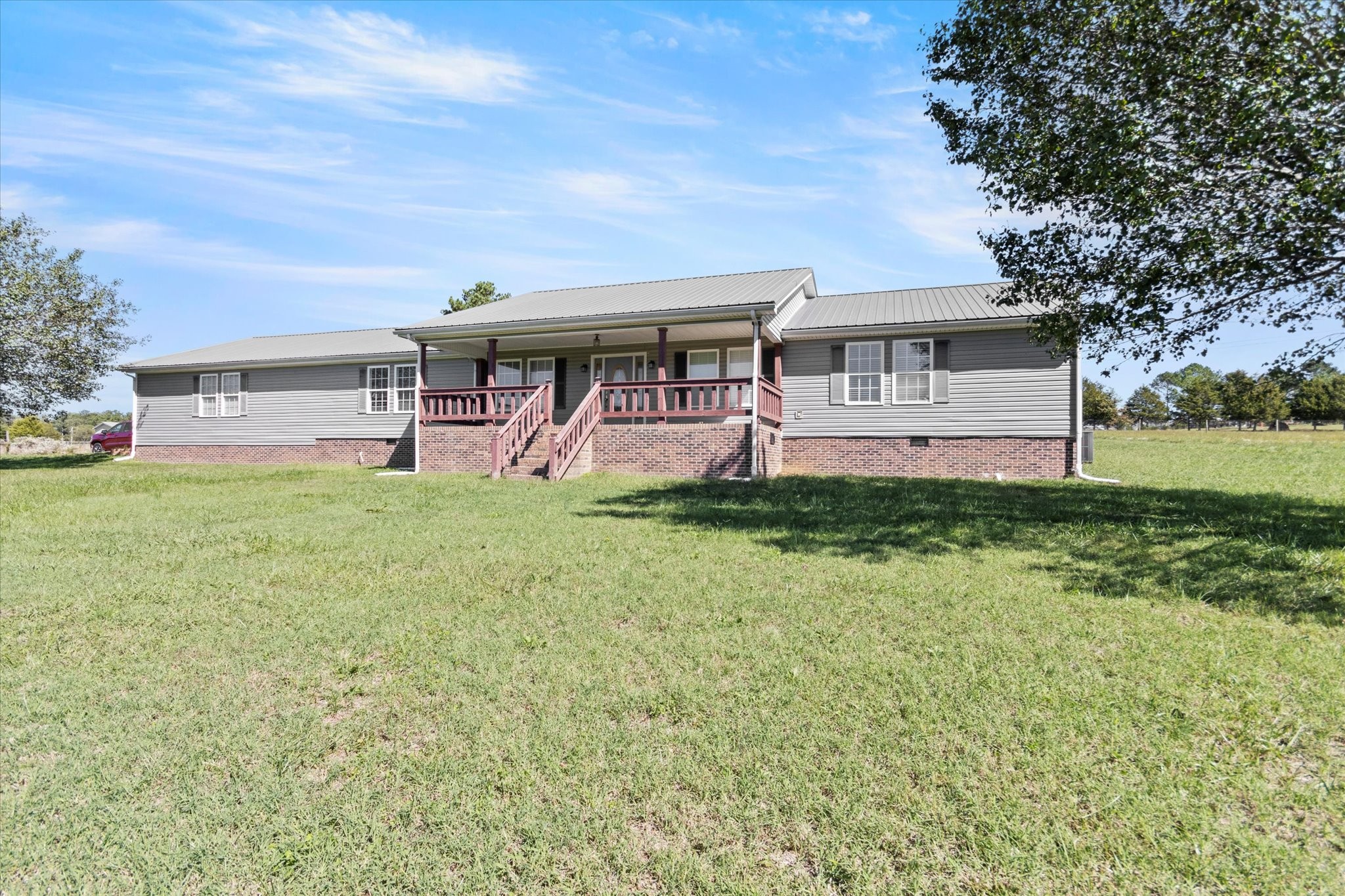 front view of a house with a big yard