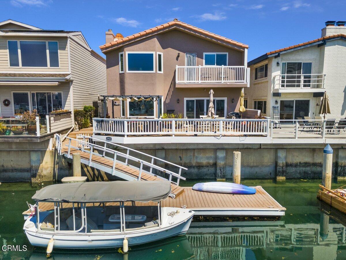 a aerial view of a house with a yard