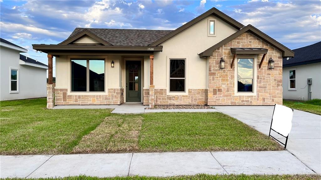 View of front of home featuring a front yard