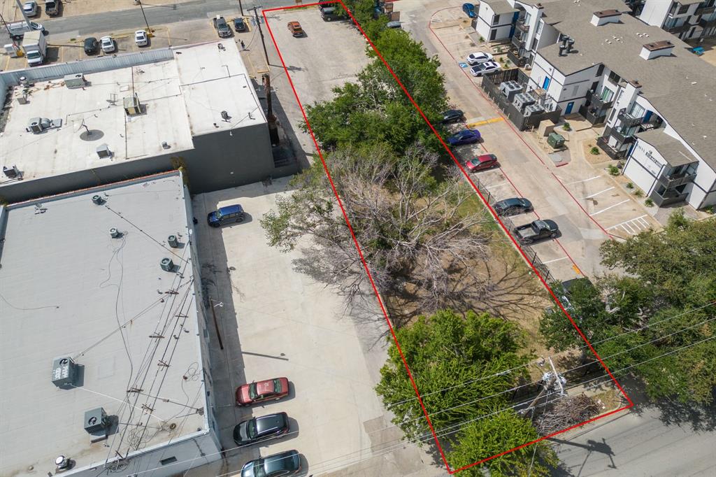 an aerial view of a house with outdoor space