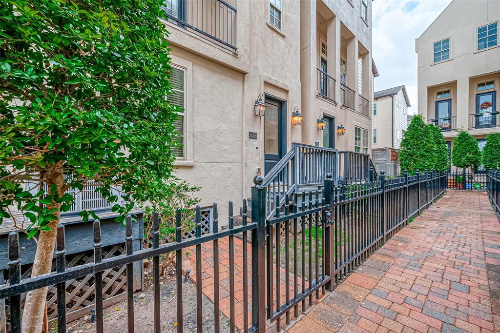 a view of a brick building from a balcony