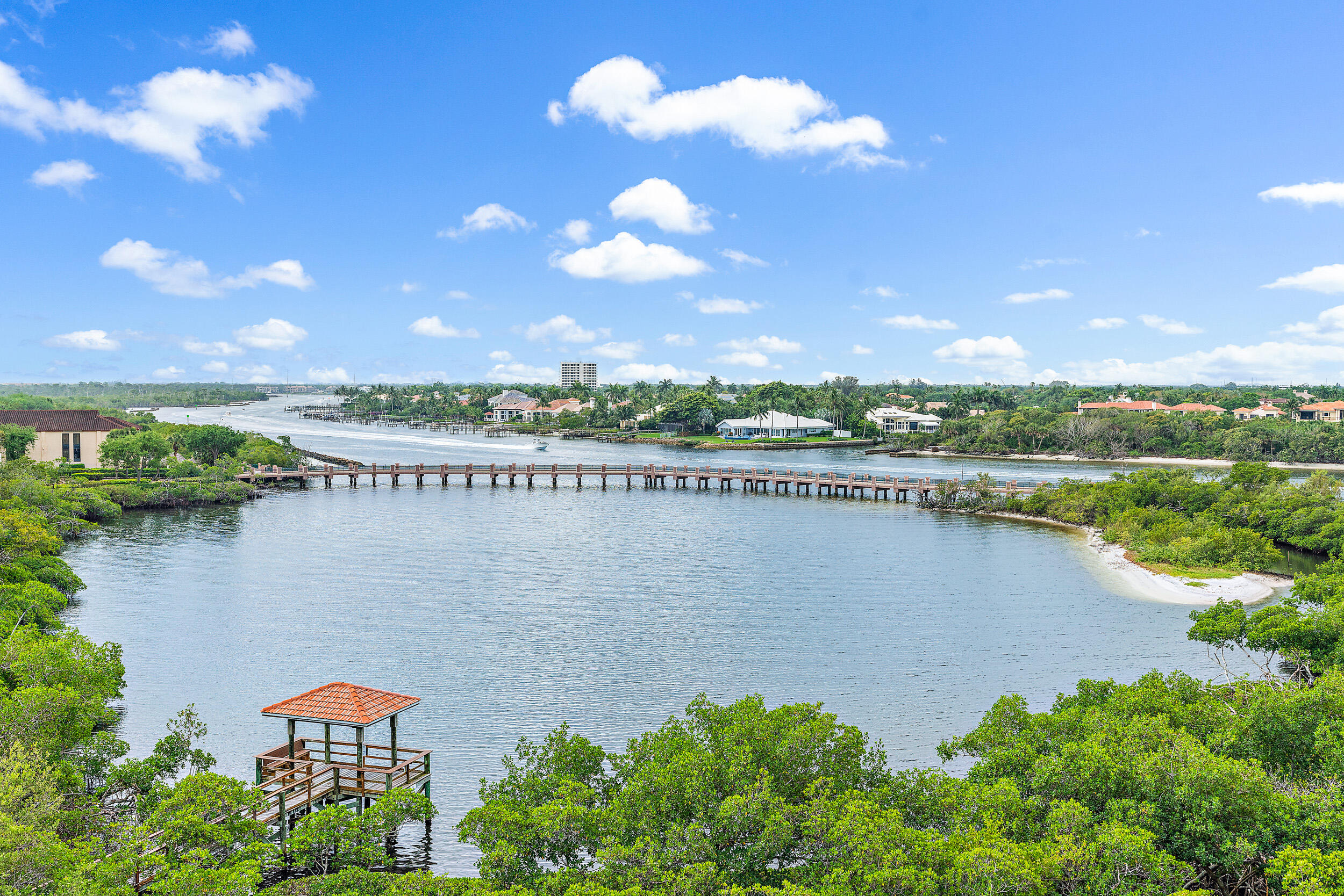 a view of a lake with a house