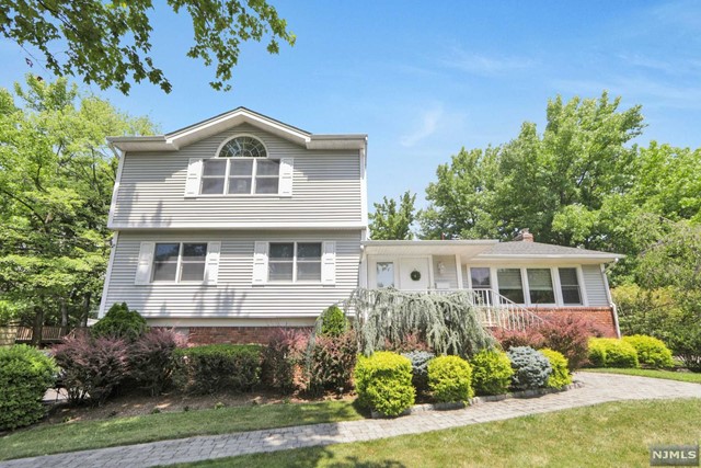 a house view with a garden space