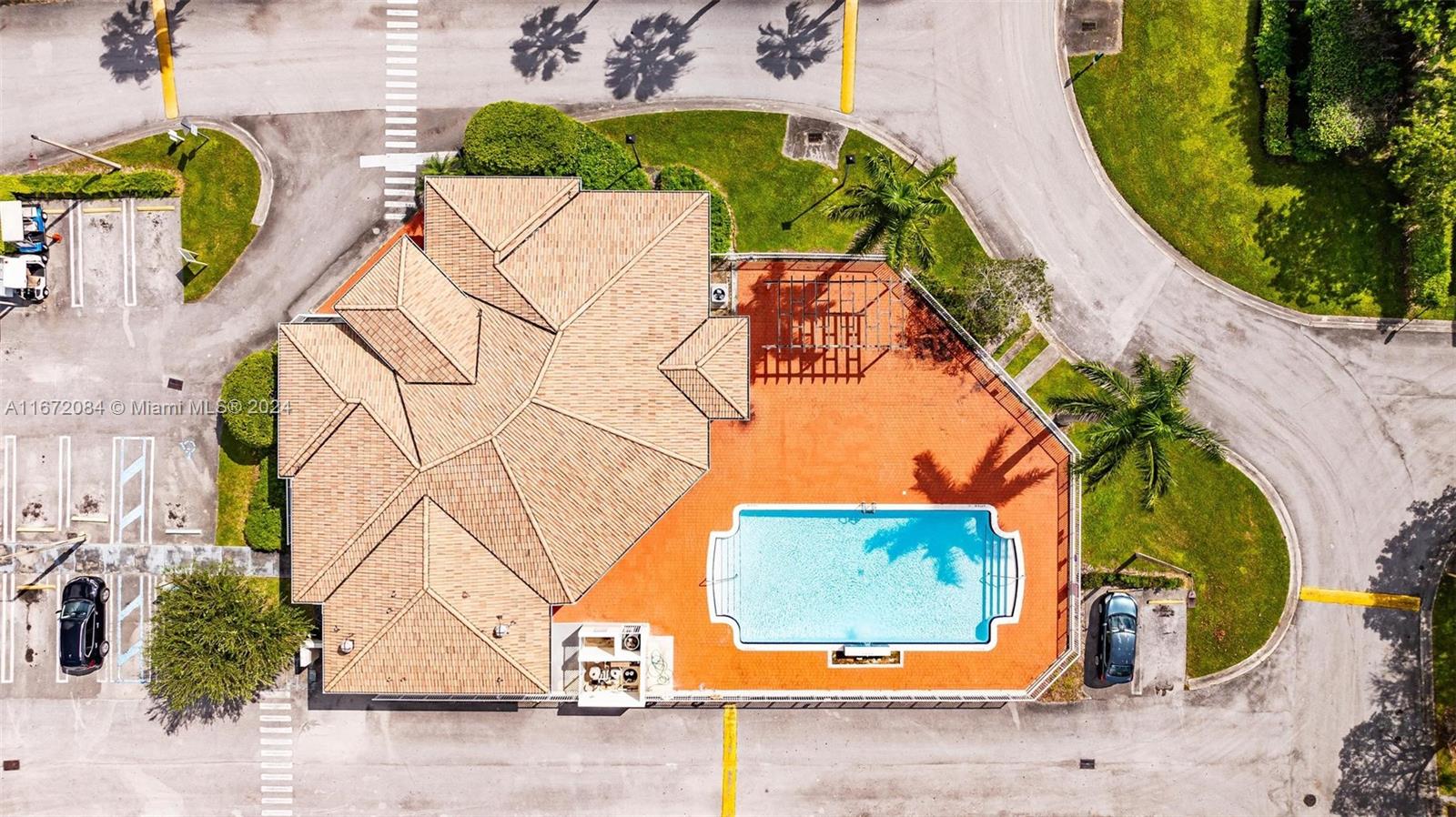 an aerial view of a swimming pool