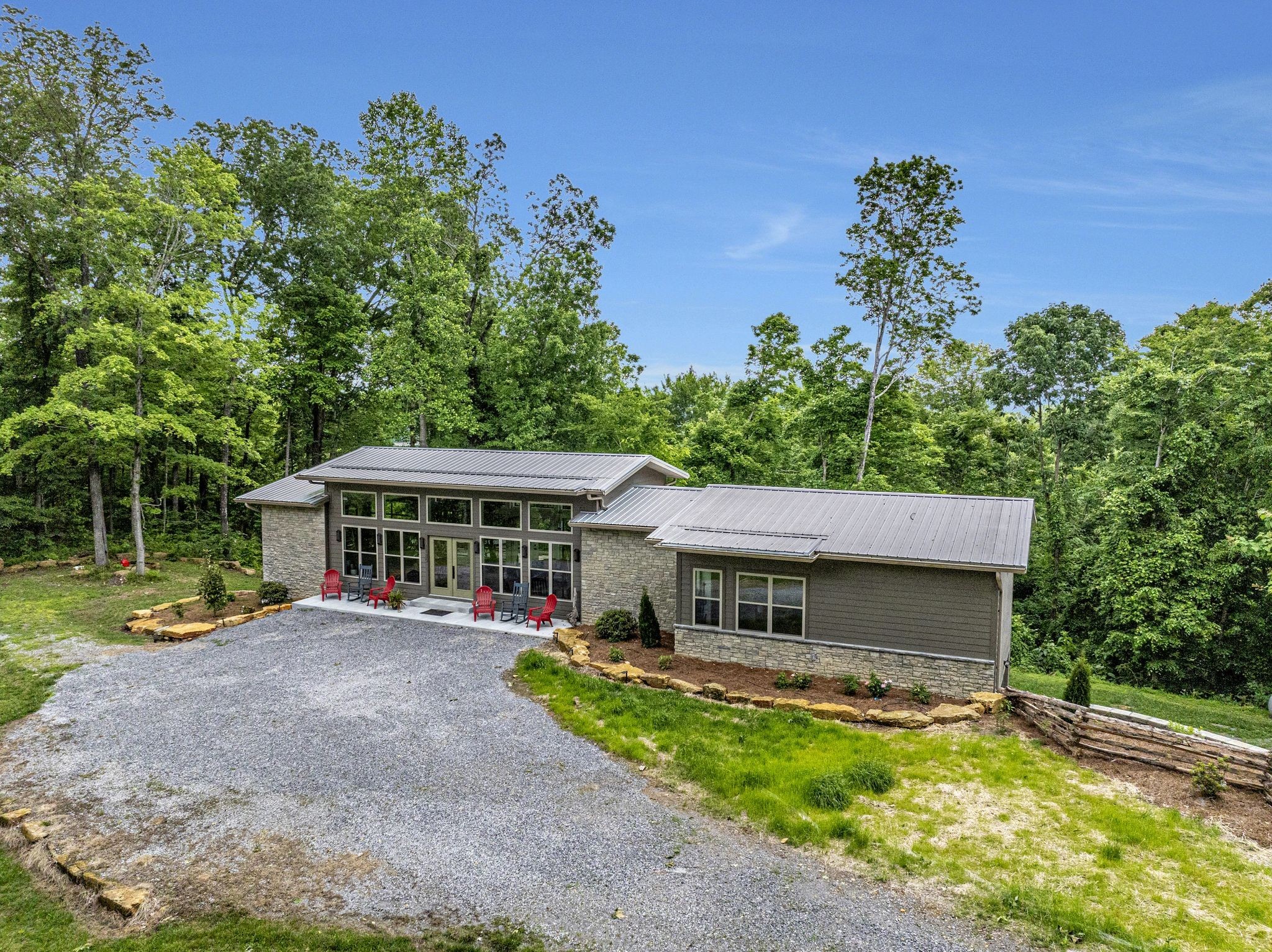 front view of a house with a yard