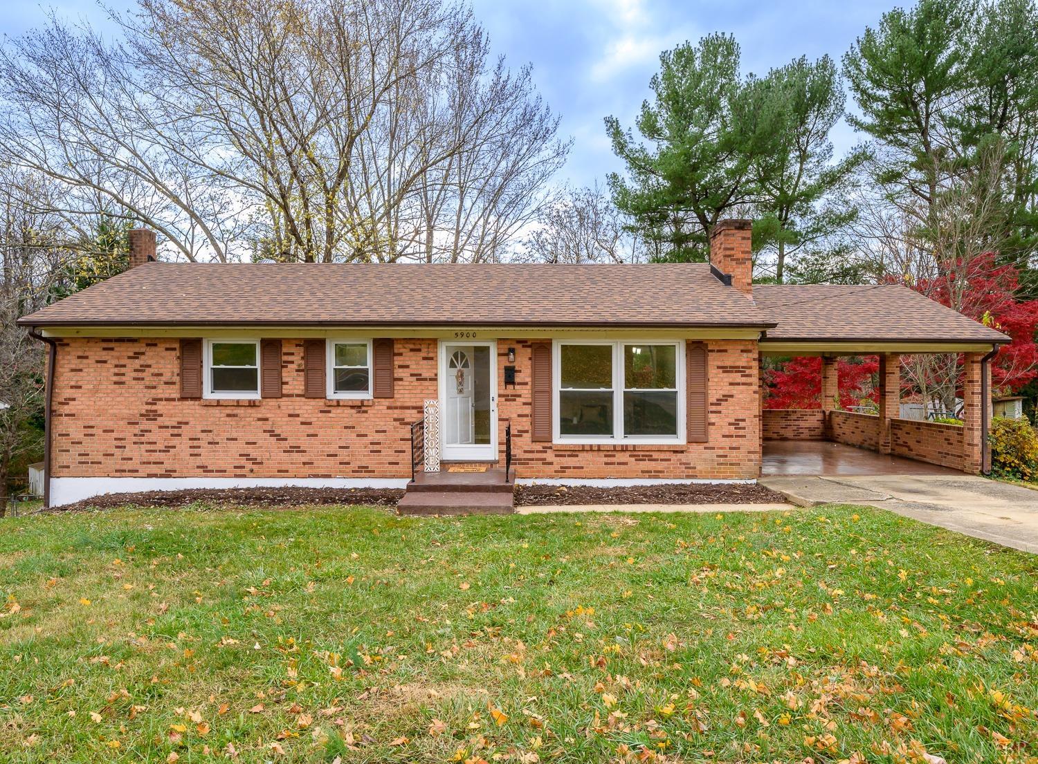 front view of a house with a yard