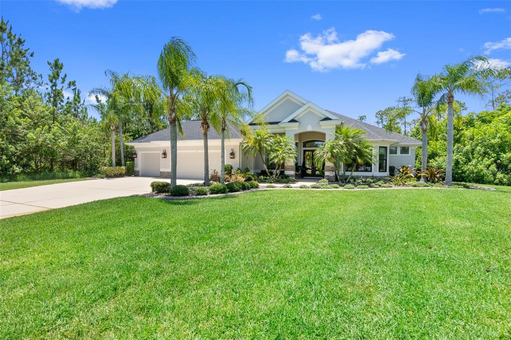 a view of a house with a big yard