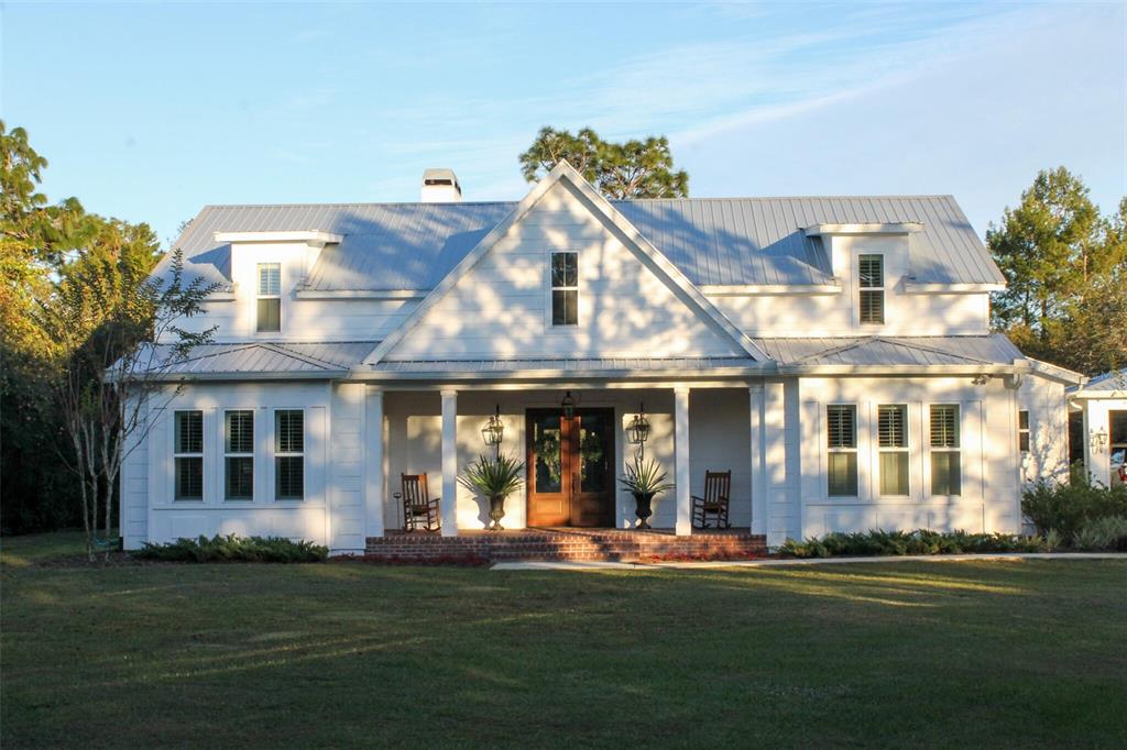 front view of a building with a garden