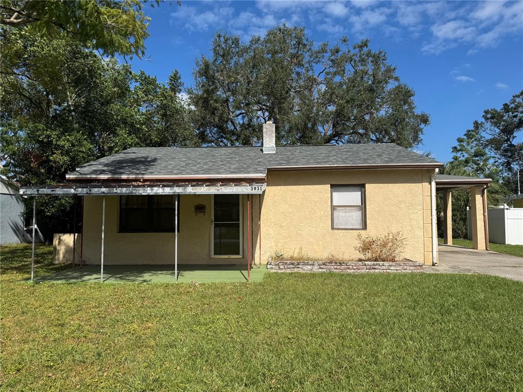 front view of a house with a yard