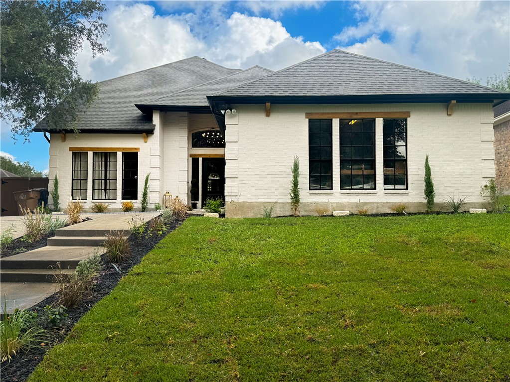 a view of a house with garden