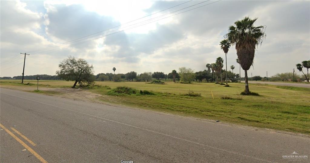 a view of a lake with a big yard