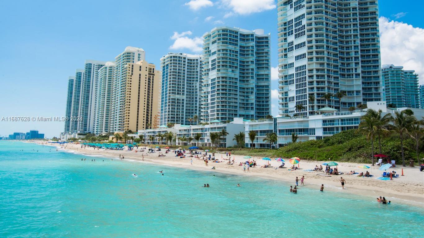 a view of a city with tall buildings