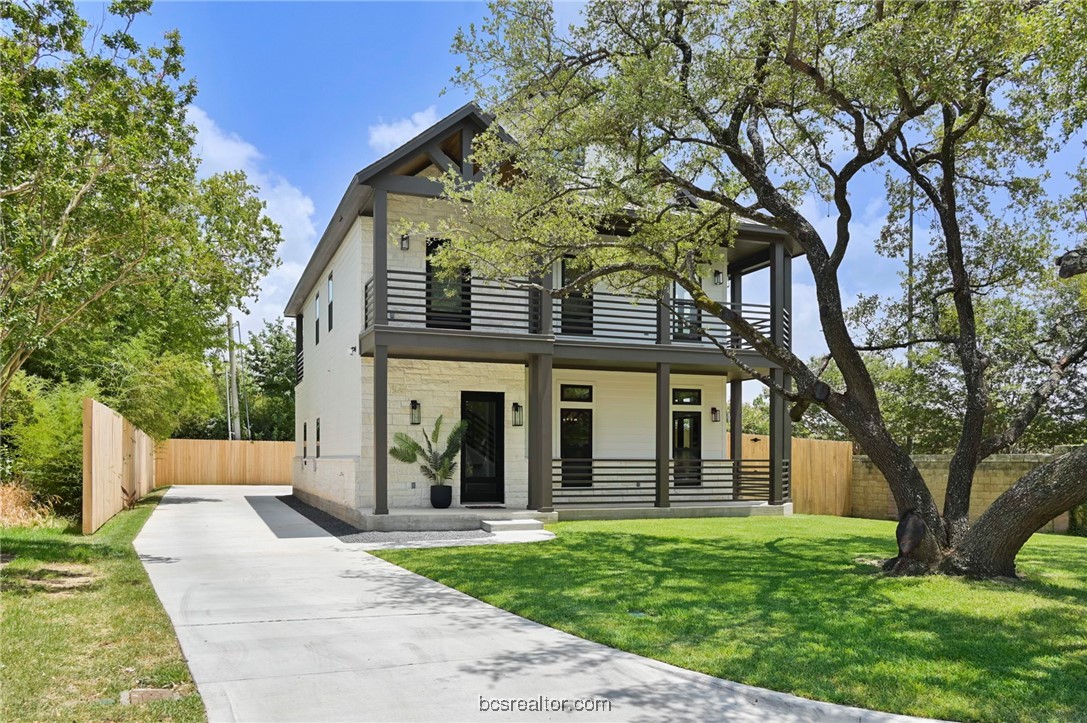 front view of a house with a yard