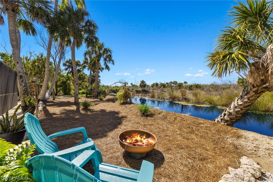 a view of a lake with a yard