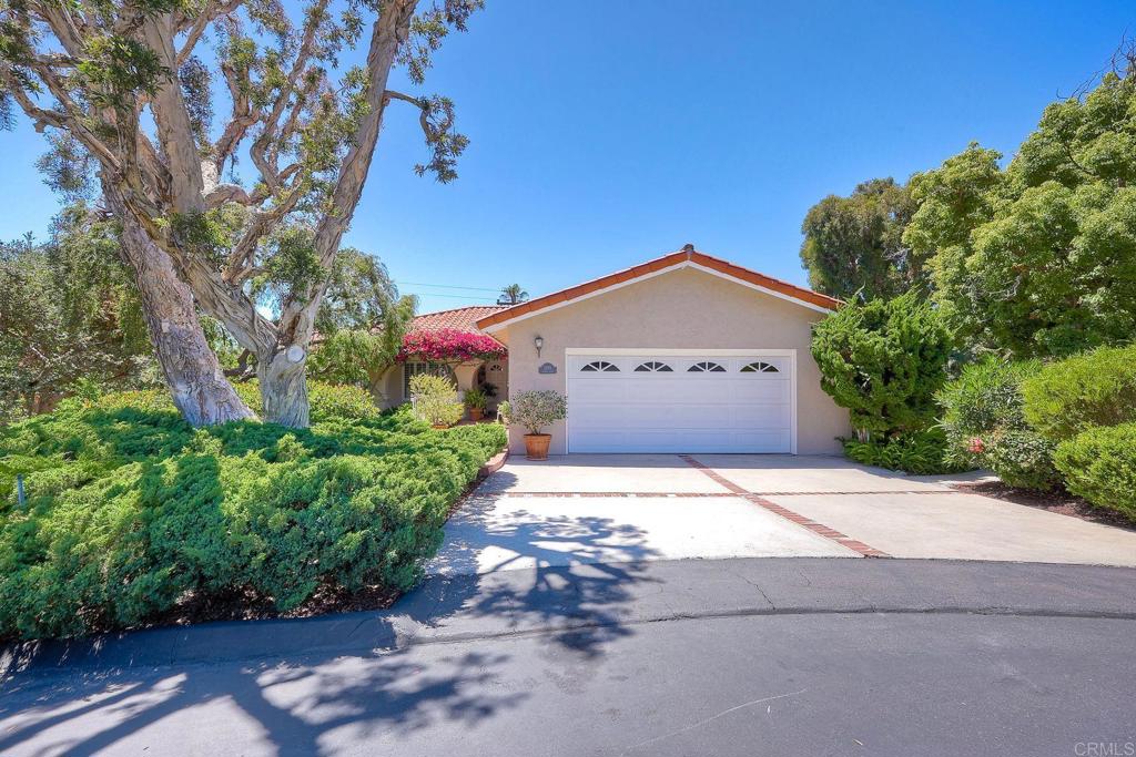 a house with yard in front of it