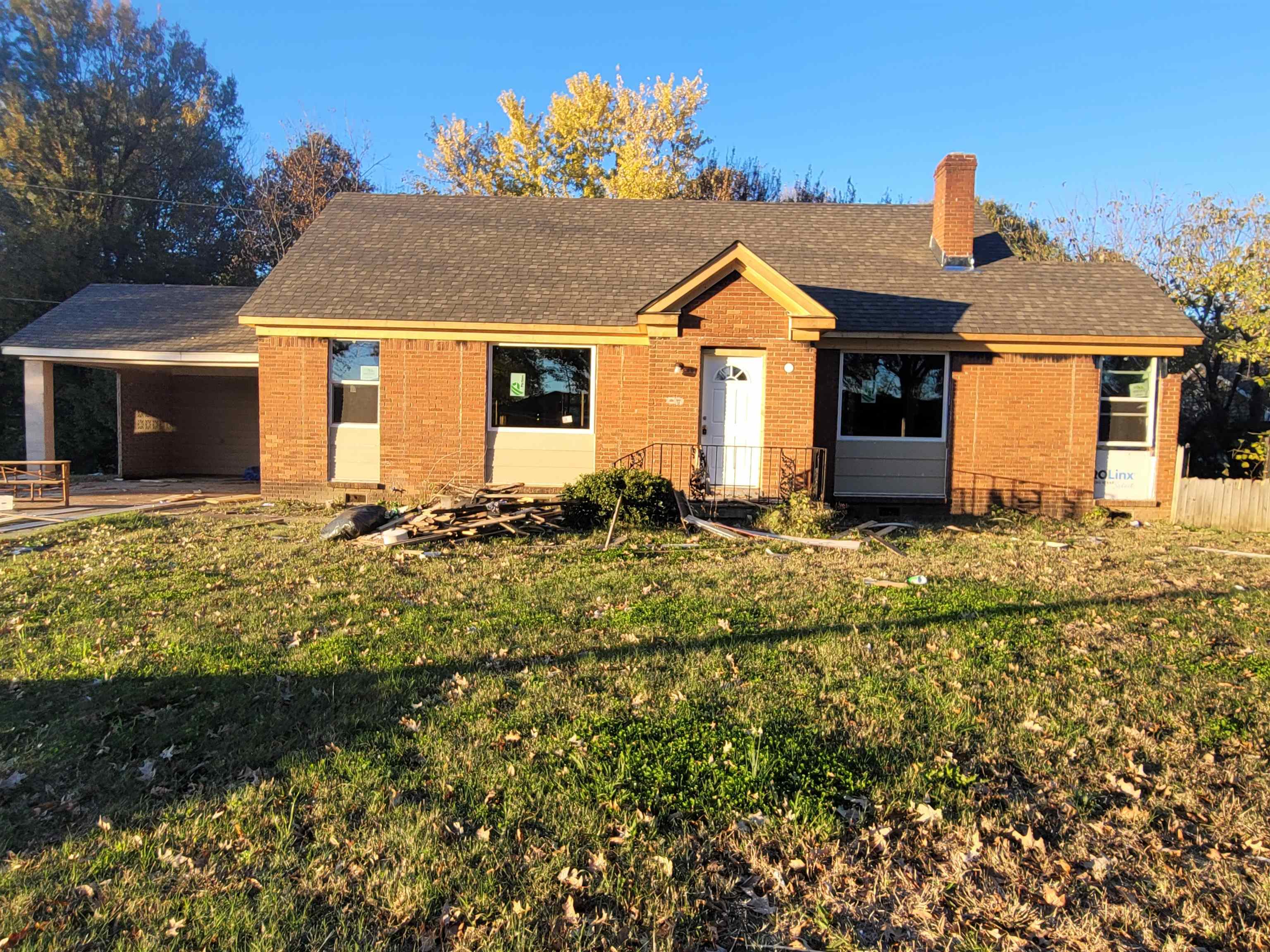 Ranch-style home with a front yard