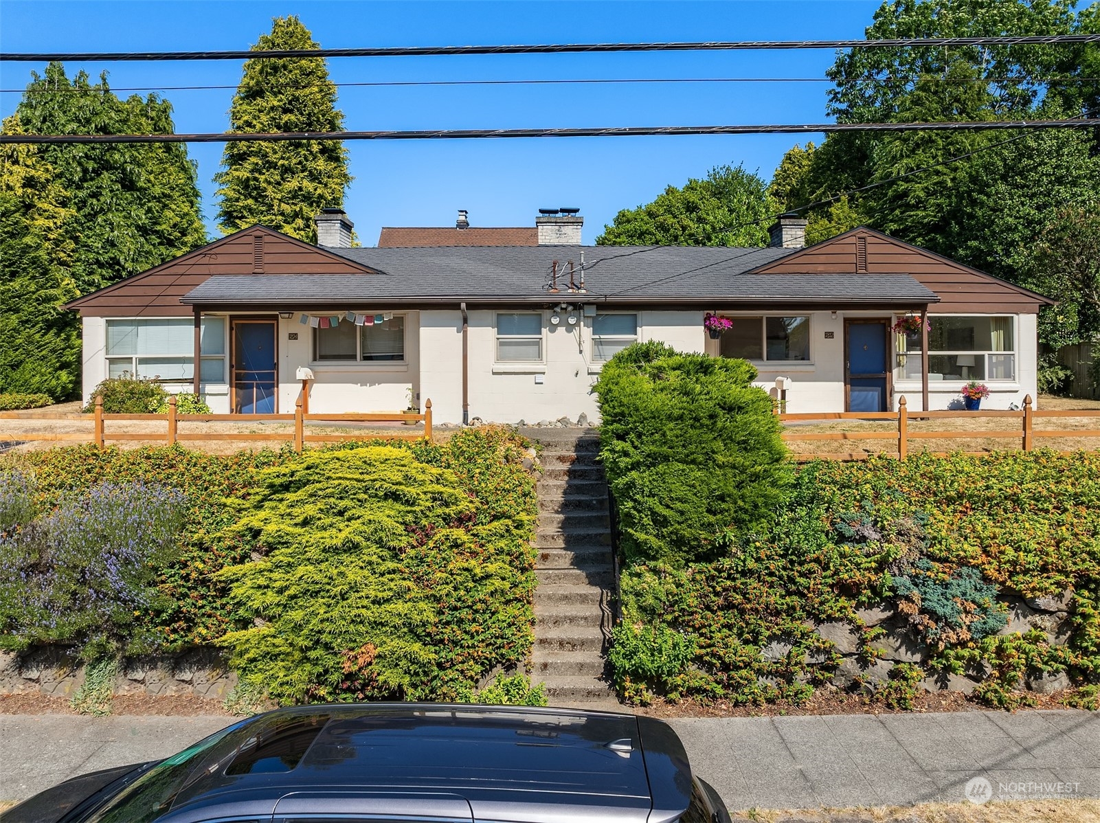 front view of a house with a yard