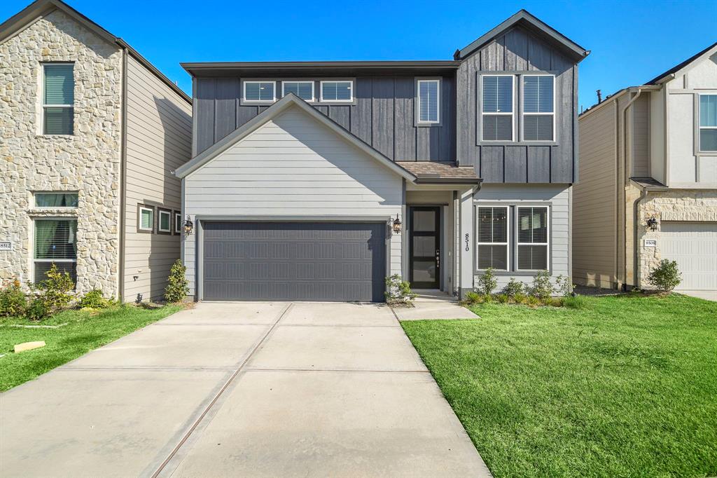 This charming modern home, situated on a premium lot, greets you with a sleek, low-maintenance exterior that showcases clean lines and a welcoming entrance. The extended driveway offers added convenience compared to most houses in this subdivision.