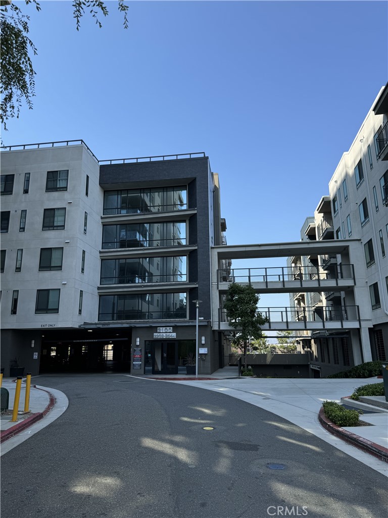 a front view of a building with street view