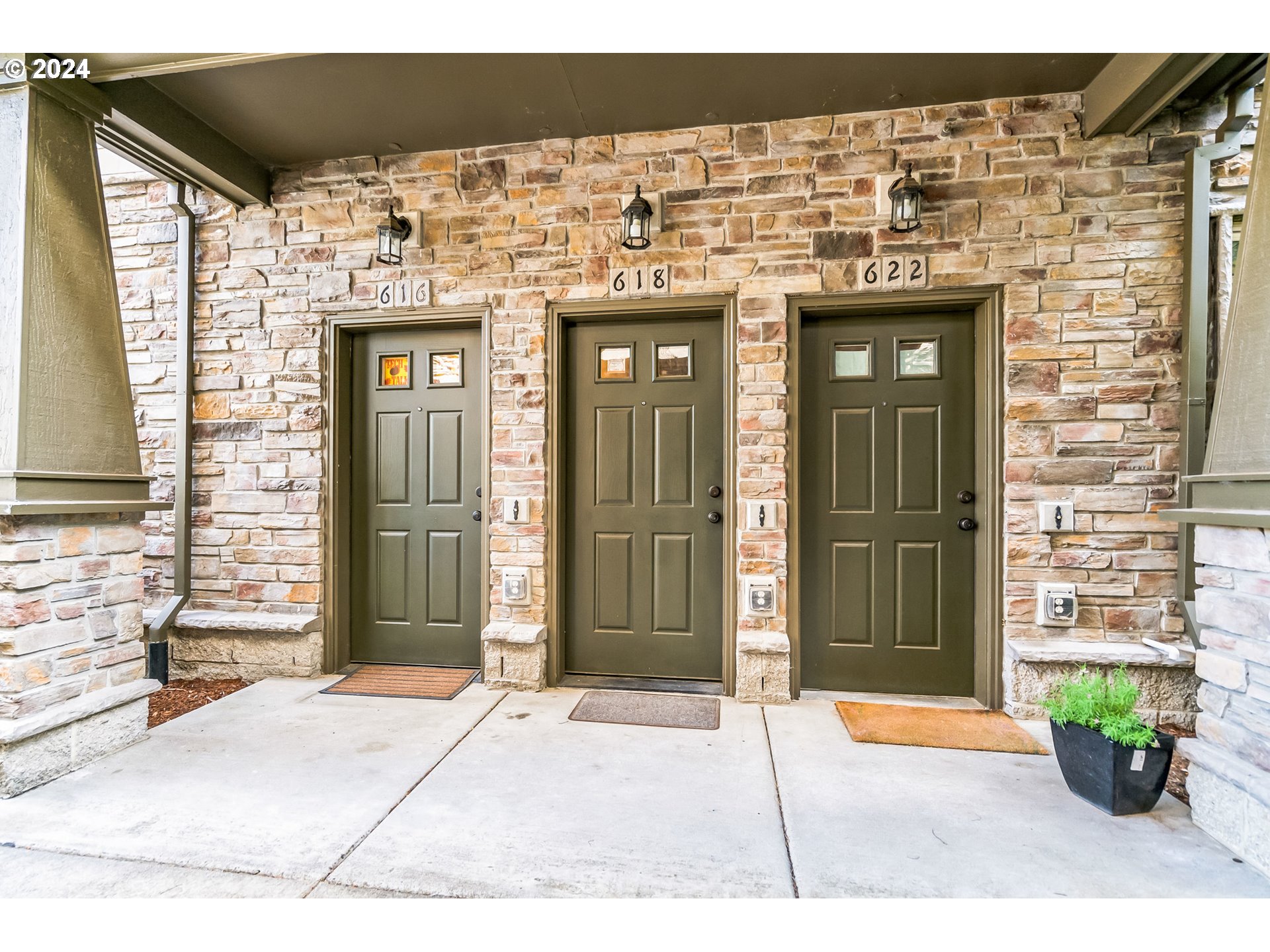 a view of a entryway door front of house