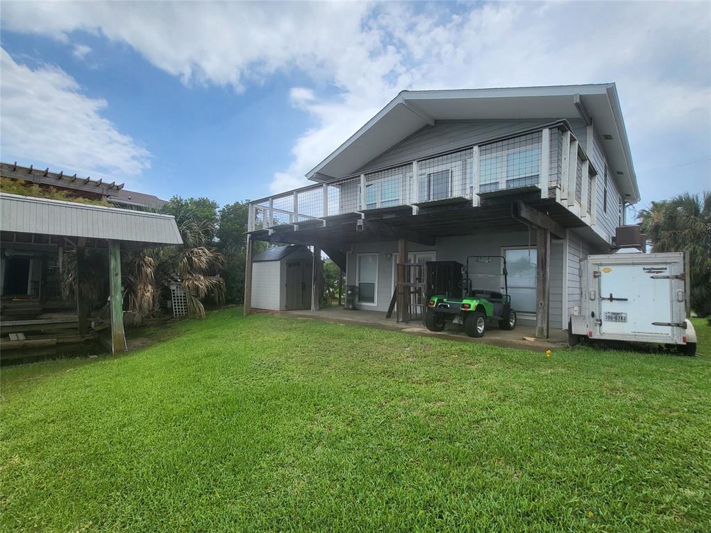 a view of a house with a back yard