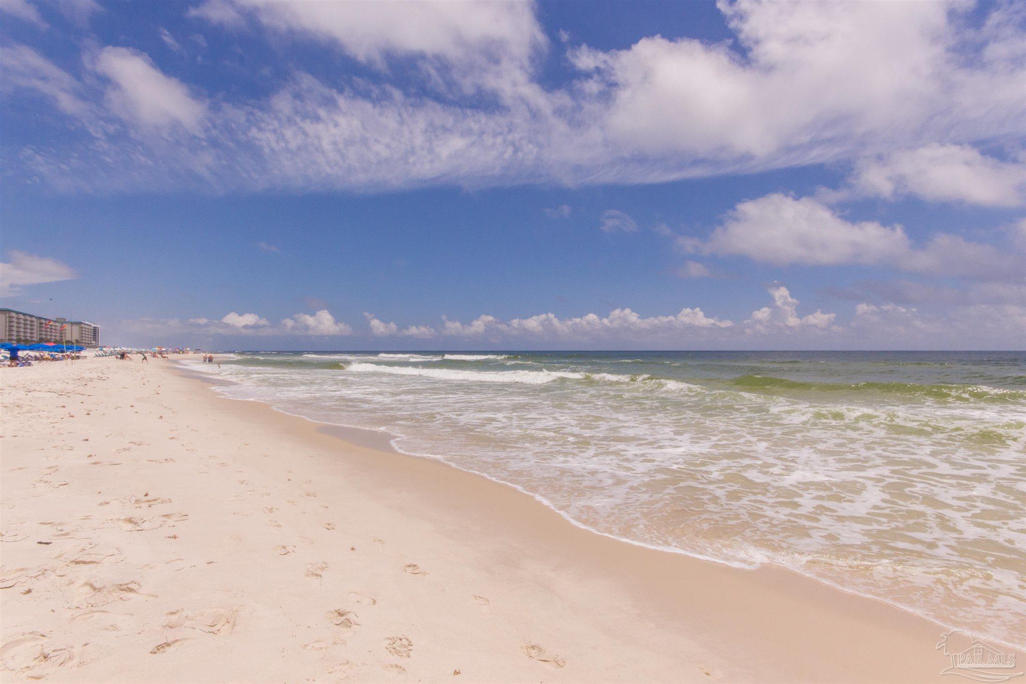 a view of an ocean and city