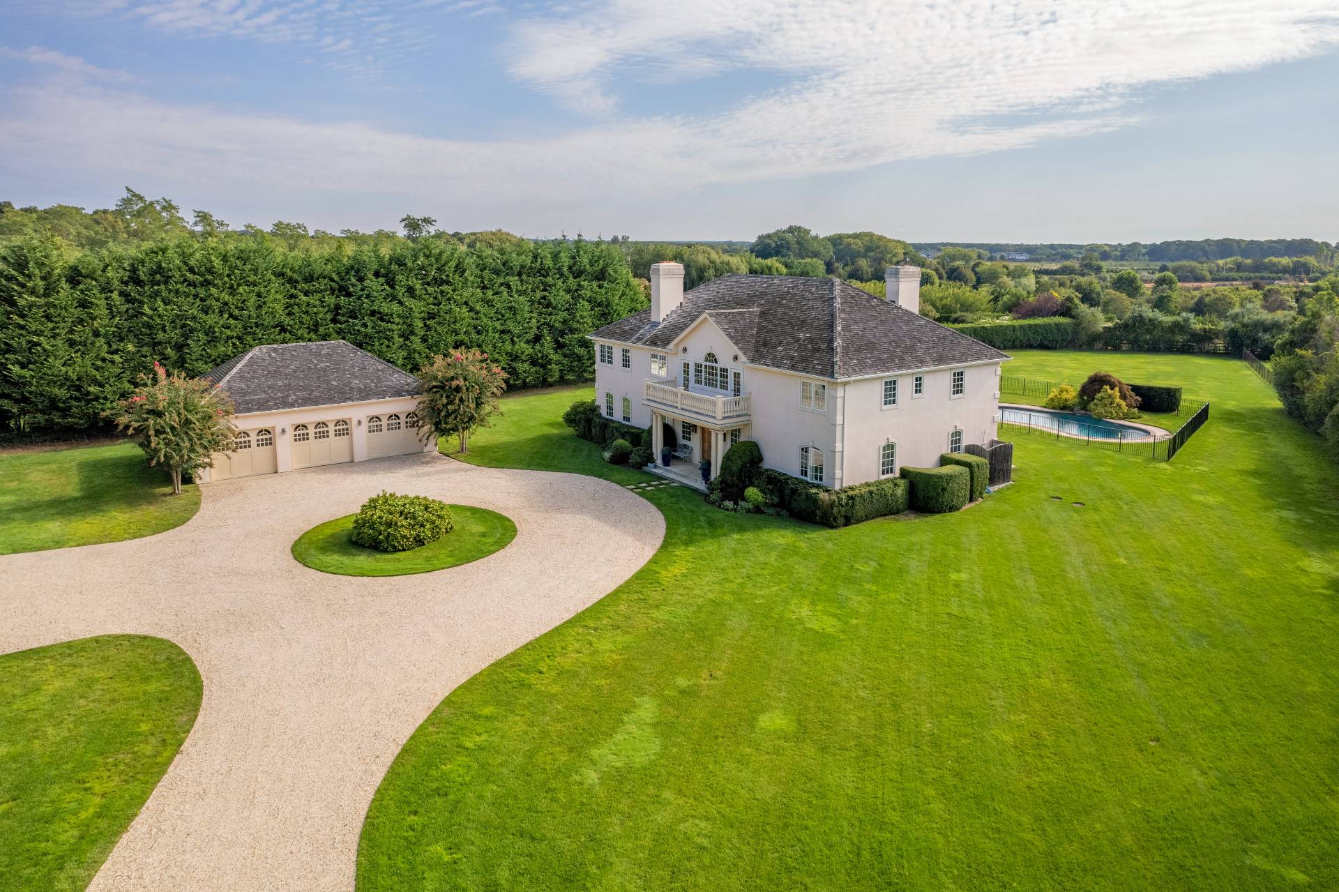 an aerial view of a house with outdoor space