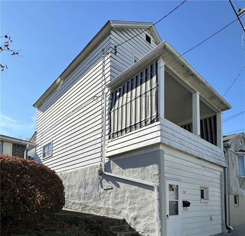 a front view of a house with a garage