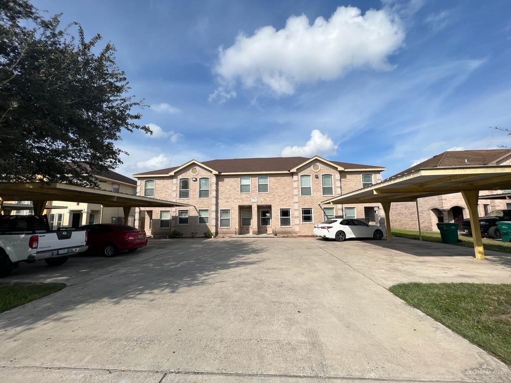 View of front facade with a carport