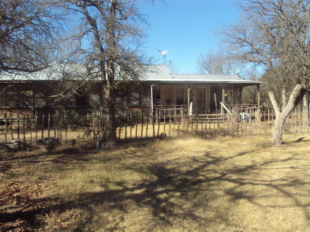 a front view of house with a yard