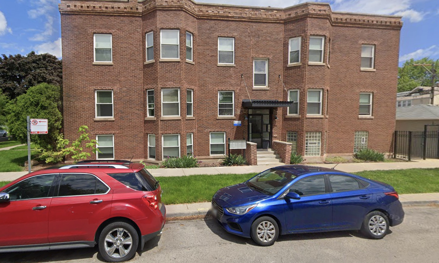 a car parked in front of a house