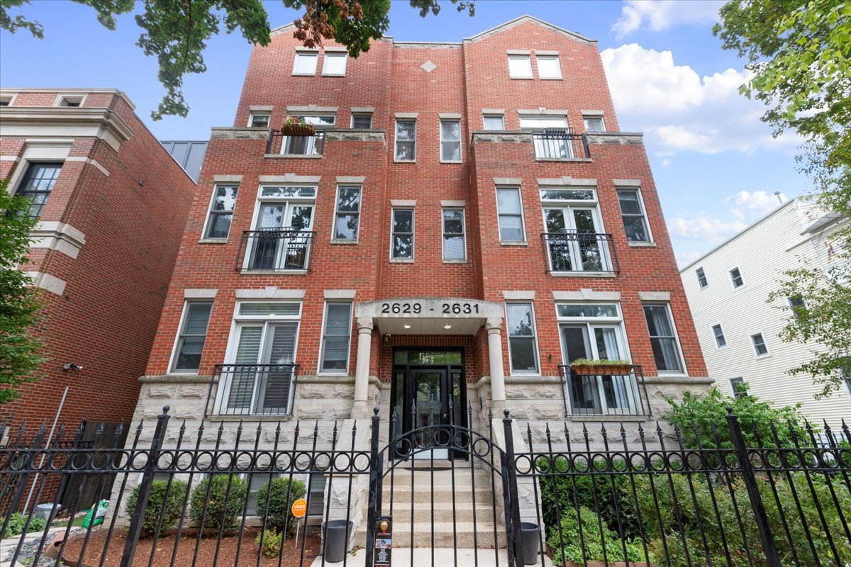 a front view of a multi story residential apartment building