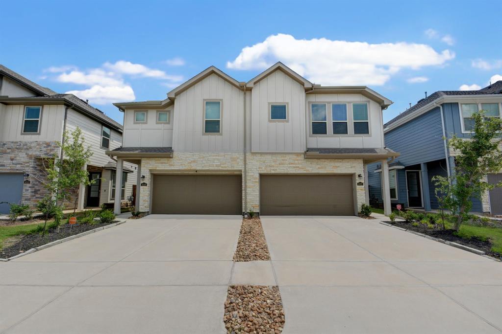 a front view of a house with yard