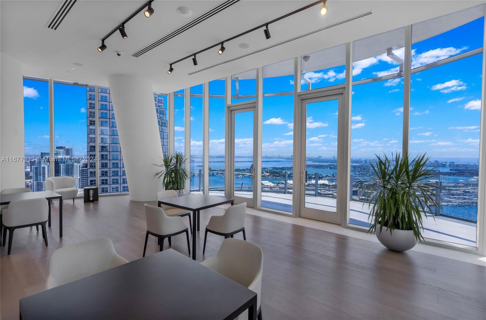 a living room with furniture and windows