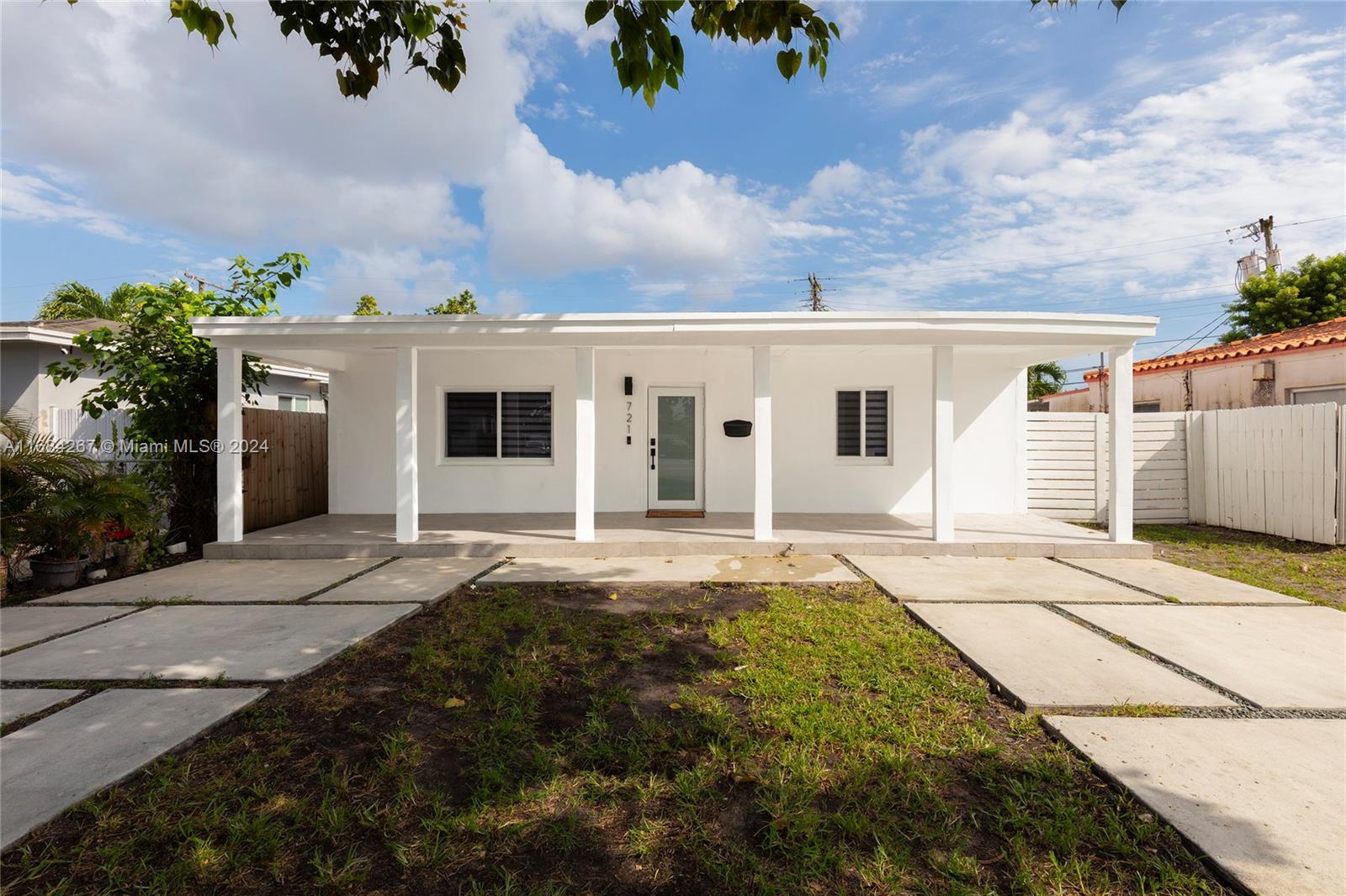 a front view of house with yard