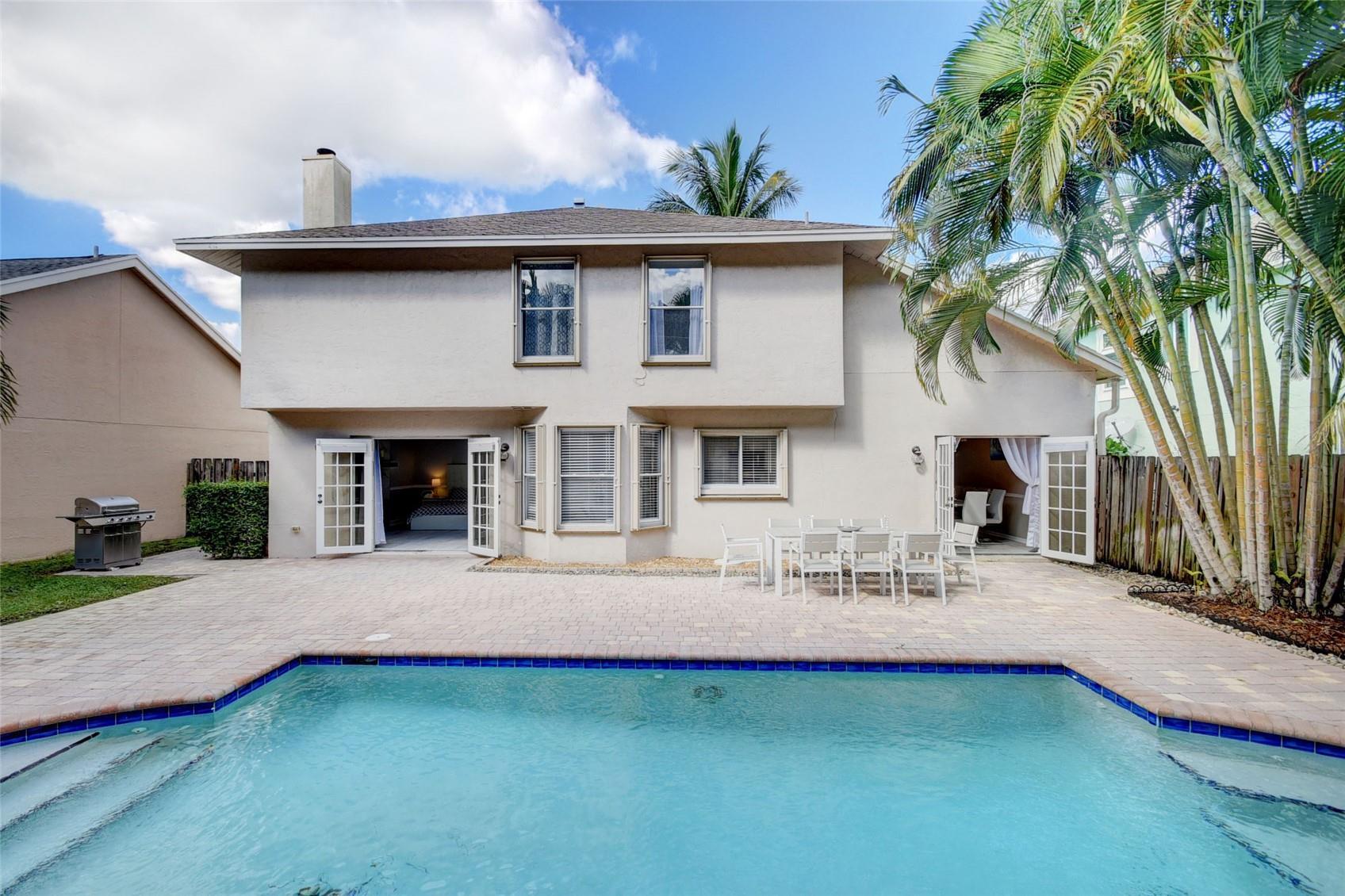 a front view of a house with patio