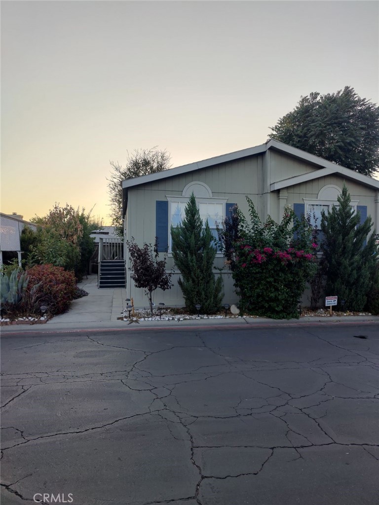 a house view with a garden space